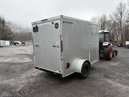 New 2026 Wells Cargo 6x10 6'6" Interior Fasttrac Deluxe Cargo / Enclosed Trailer with Ramp Door
