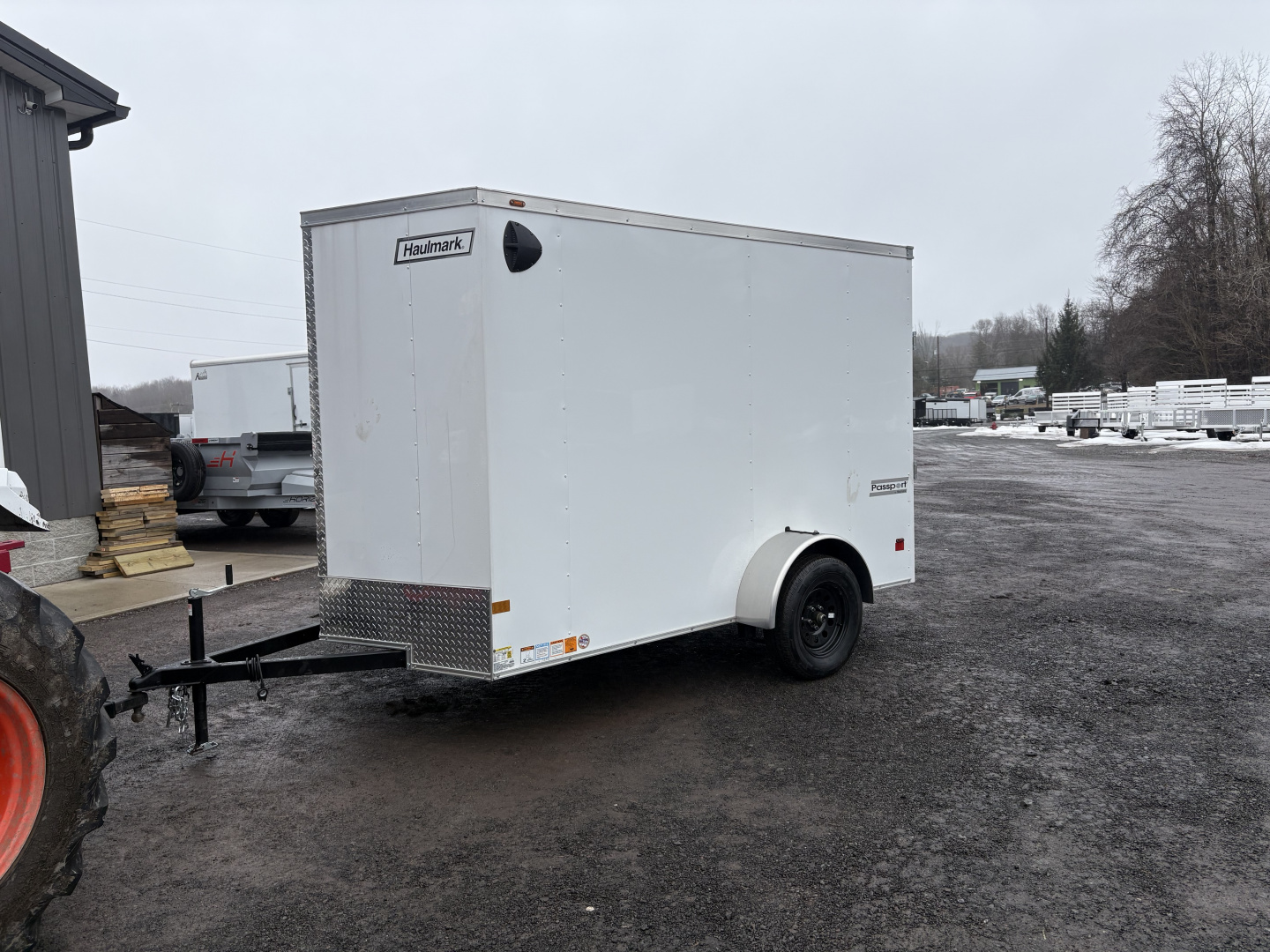 New 2026 Haulmark 6x10 6'6" Interior Passport Deluxe Cargo / Enclosed Trailer with Ramp Door