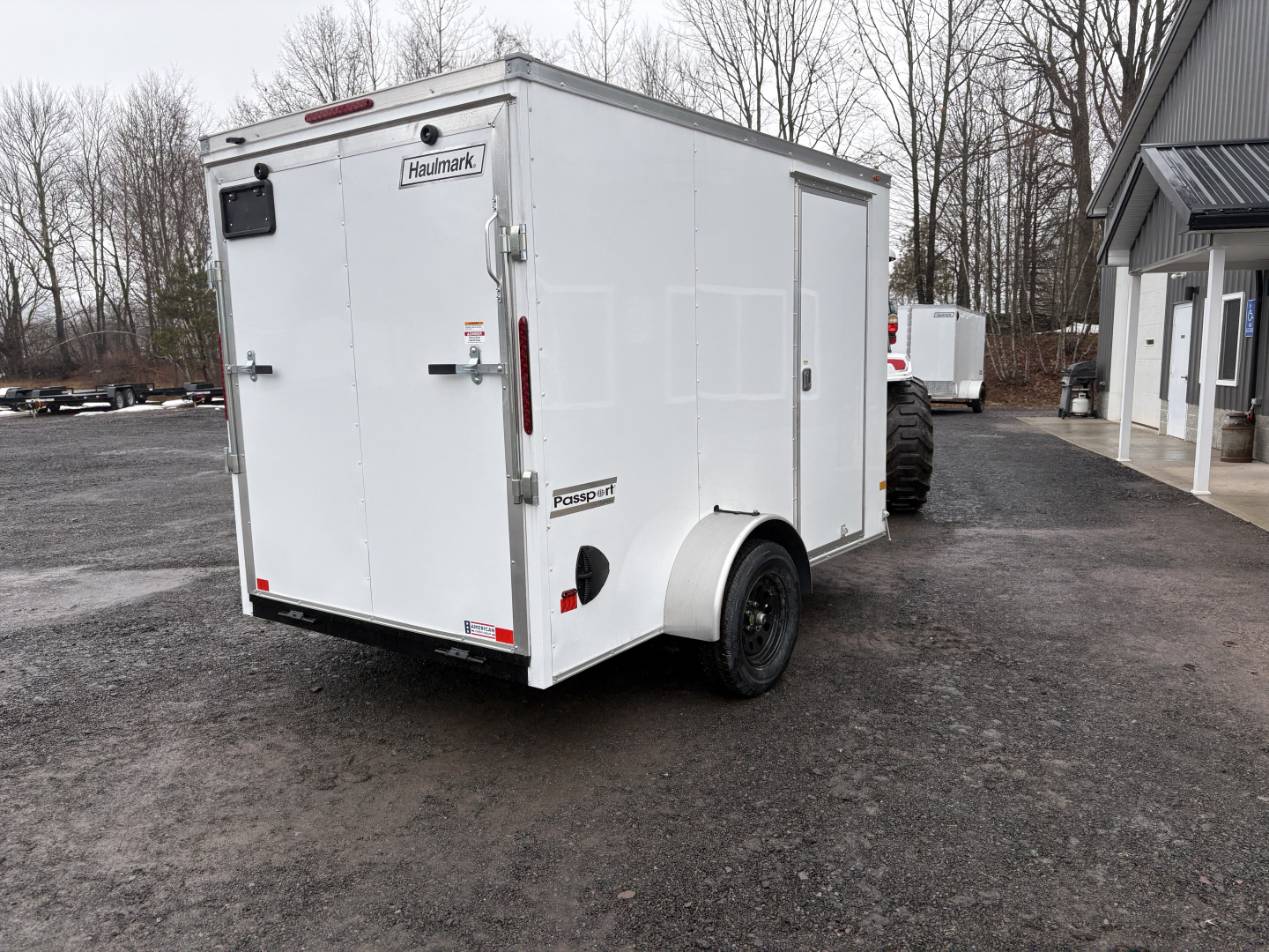 New 2026 Haulmark 6x10 6'6" Interior Passport Deluxe Cargo / Enclosed Trailer with Ramp Door