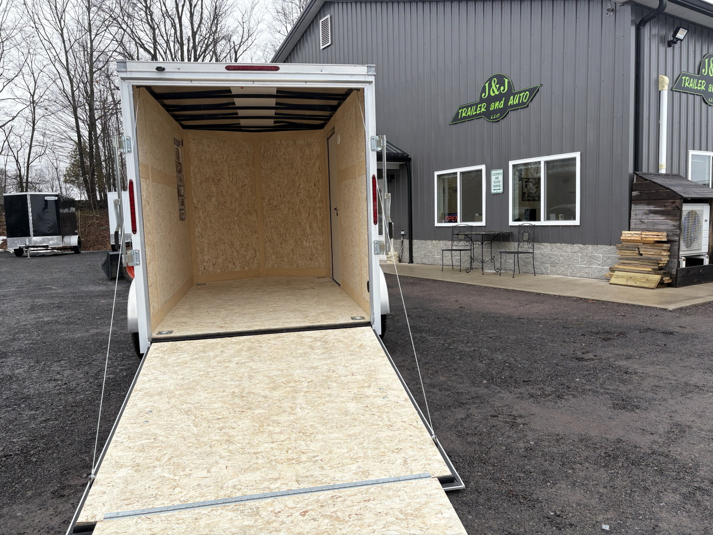 New 2026 Haulmark 6x10 6'6" Interior Passport Deluxe Cargo / Enclosed Trailer with Ramp Door