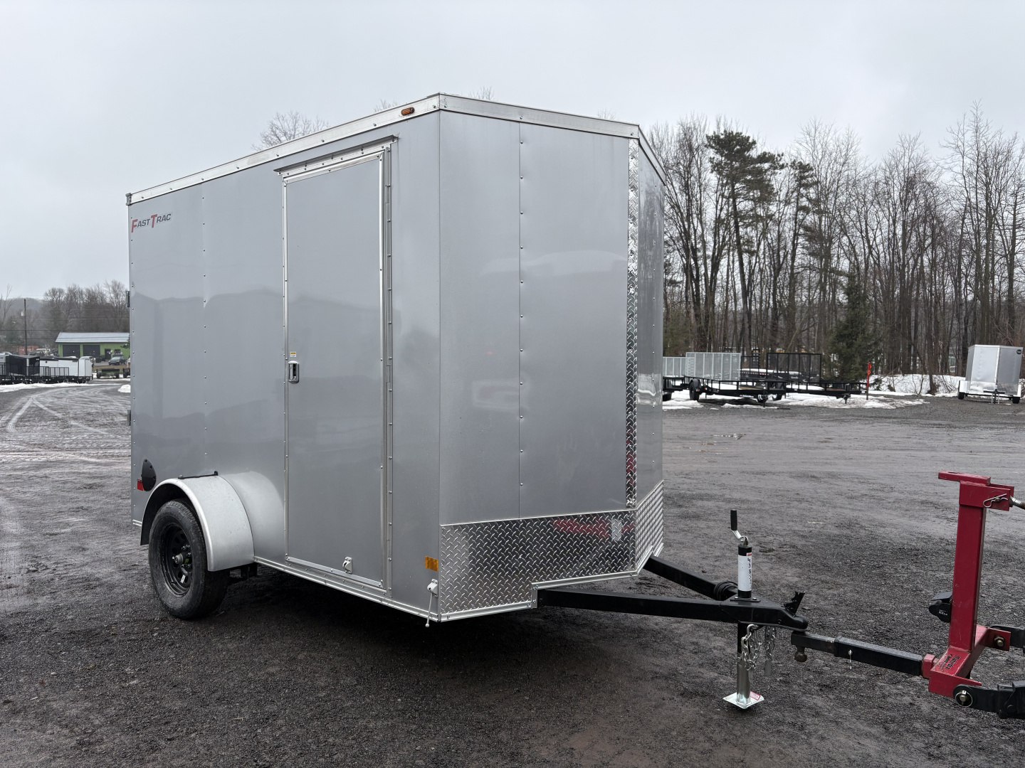 New 2026 Wells Cargo 6x10 7' Interior Height Fasttrac Deluxe with Rear Ramp Door Cargo / Enclosed Trailer