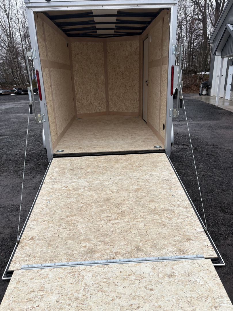 New 2026 6x10 6'6" Interior Wells Cargo Cargo / Enclosed Trailer with Ramp Door