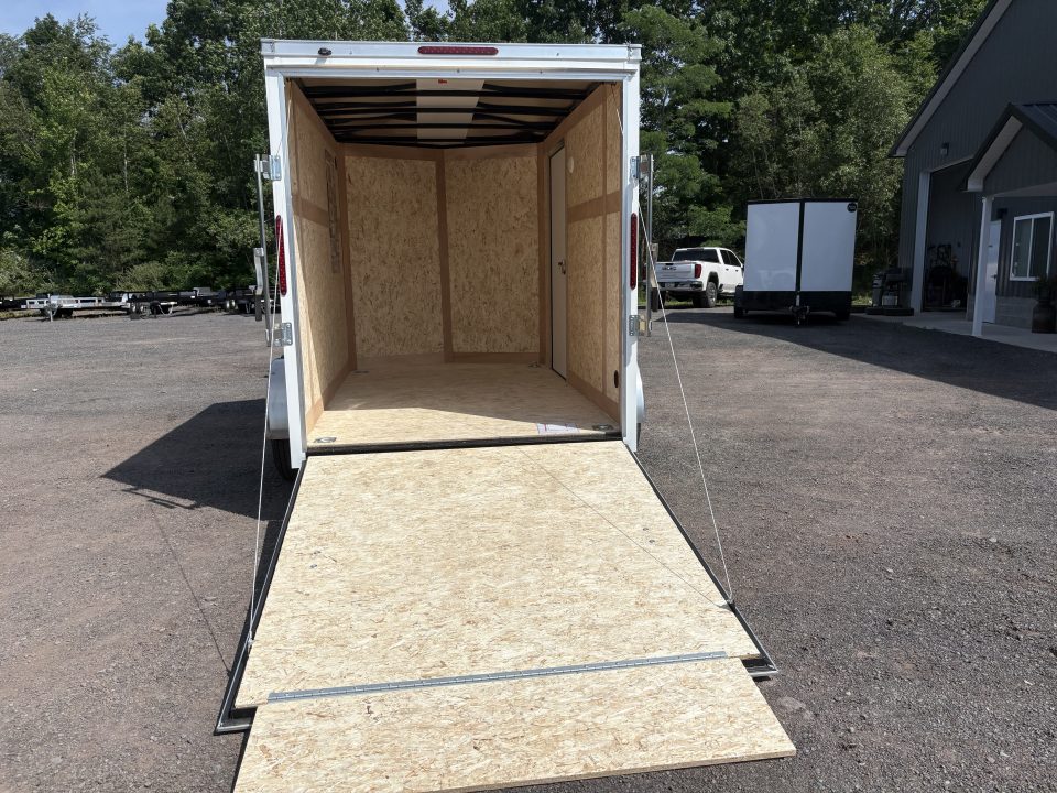 New 2026 Haulmark 6x10 6'6" Interior Passport Deluxe Cargo / Enclosed Trailer with Ramp Door