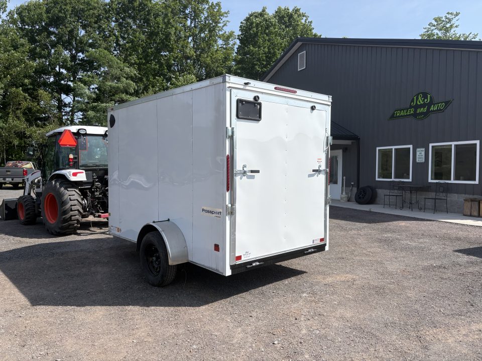 New 2026 Haulmark 6x10 6'6" Interior Passport Deluxe Cargo / Enclosed Trailer with Ramp Door