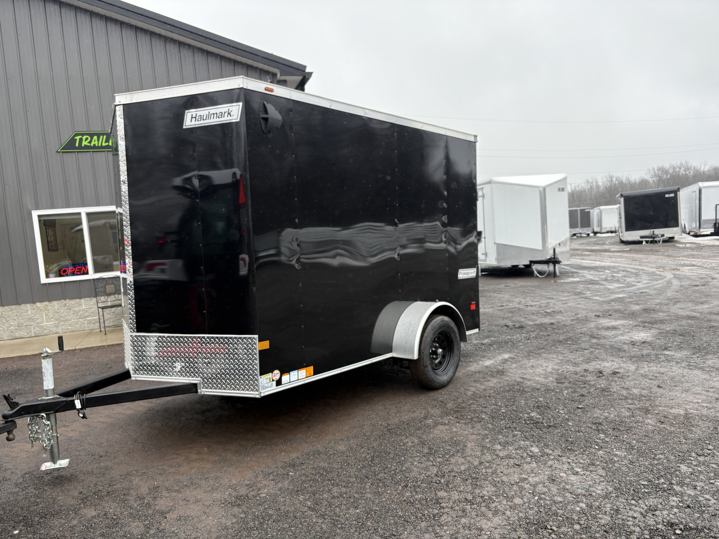 New 2026 Haulmark 6x10 6'6" Interior Passport Deluxe Cargo / Enclosed Trailer with Ramp Door