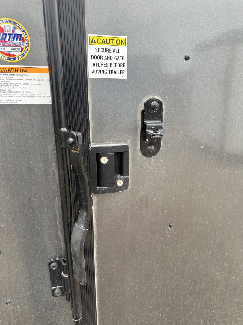 New 2025 Cargo Craft 6'x12'x6'6" Elite V Nose Sport with Ramp door in White / Black out Cargo / Enclosed Trailer