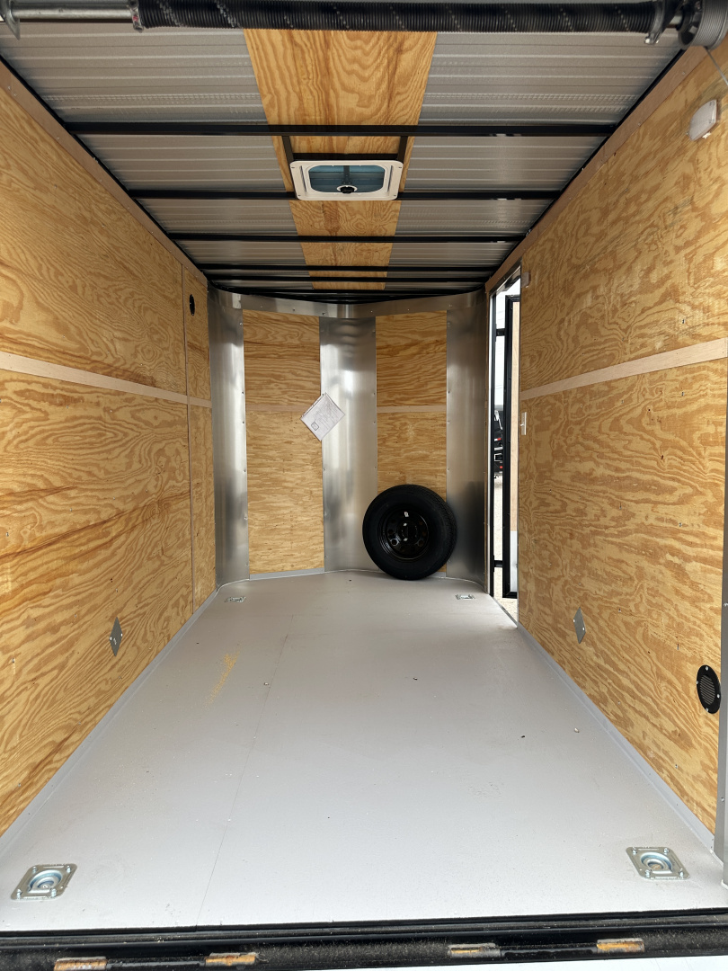 New 2025 Cargo Craft 6'x12'x6'6" Elite V Nose Sport with Ramp door in White / Black out Cargo / Enclosed Trailer