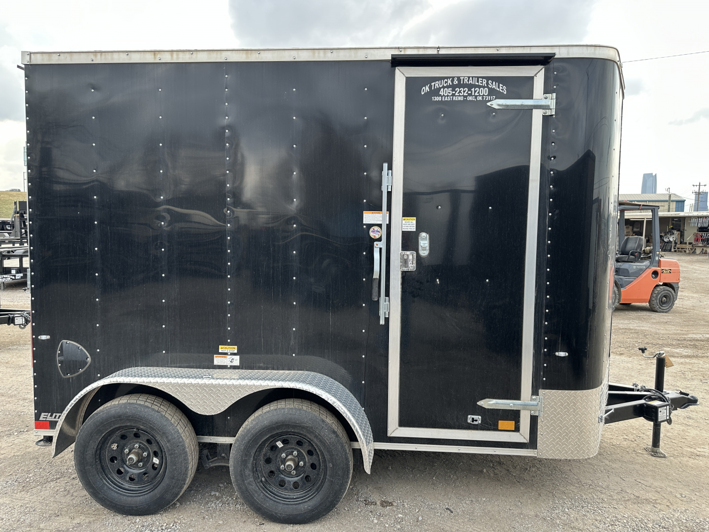 New 2025 Cargo Craft 6'x12'x7' Tall Tandem Axle Elite V Nose Sport package with ramp door, black Cargo / Enclosed Trailer