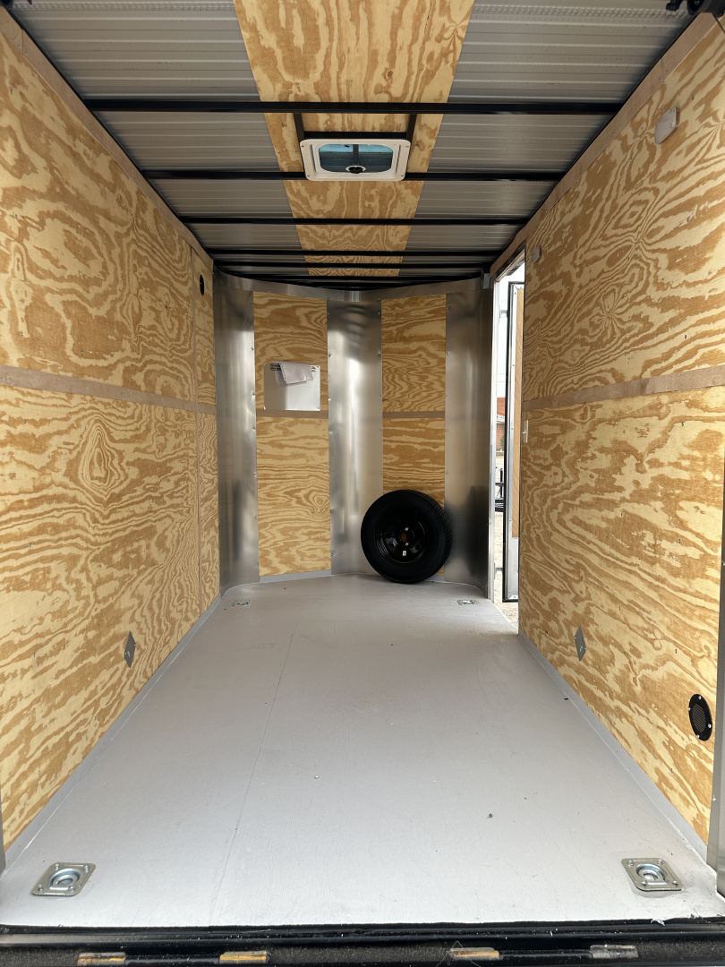 New 2025 Cargo Craft 6'x12'x7' Tall Tandem Axle Elite V Nose Sport package with ramp door, black Cargo / Enclosed Trailer