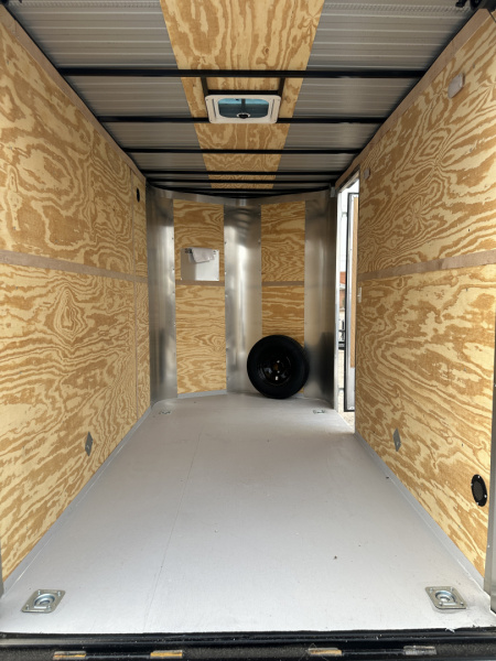 New 2025 Cargo Craft 6'x12'x7' Tall Tandem Axle Elite V Nose Sport package with ramp door, black Cargo / Enclosed Trailer