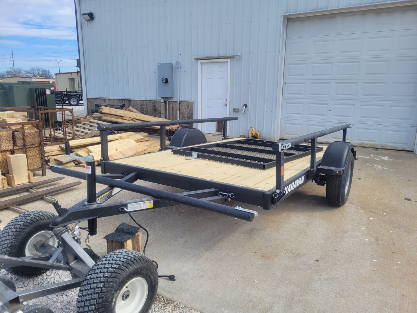 Karavan Trailer Ramp New 2027 Karavan 6x10 SA, 3.5k axle, with pivoting rails and a 49 ...