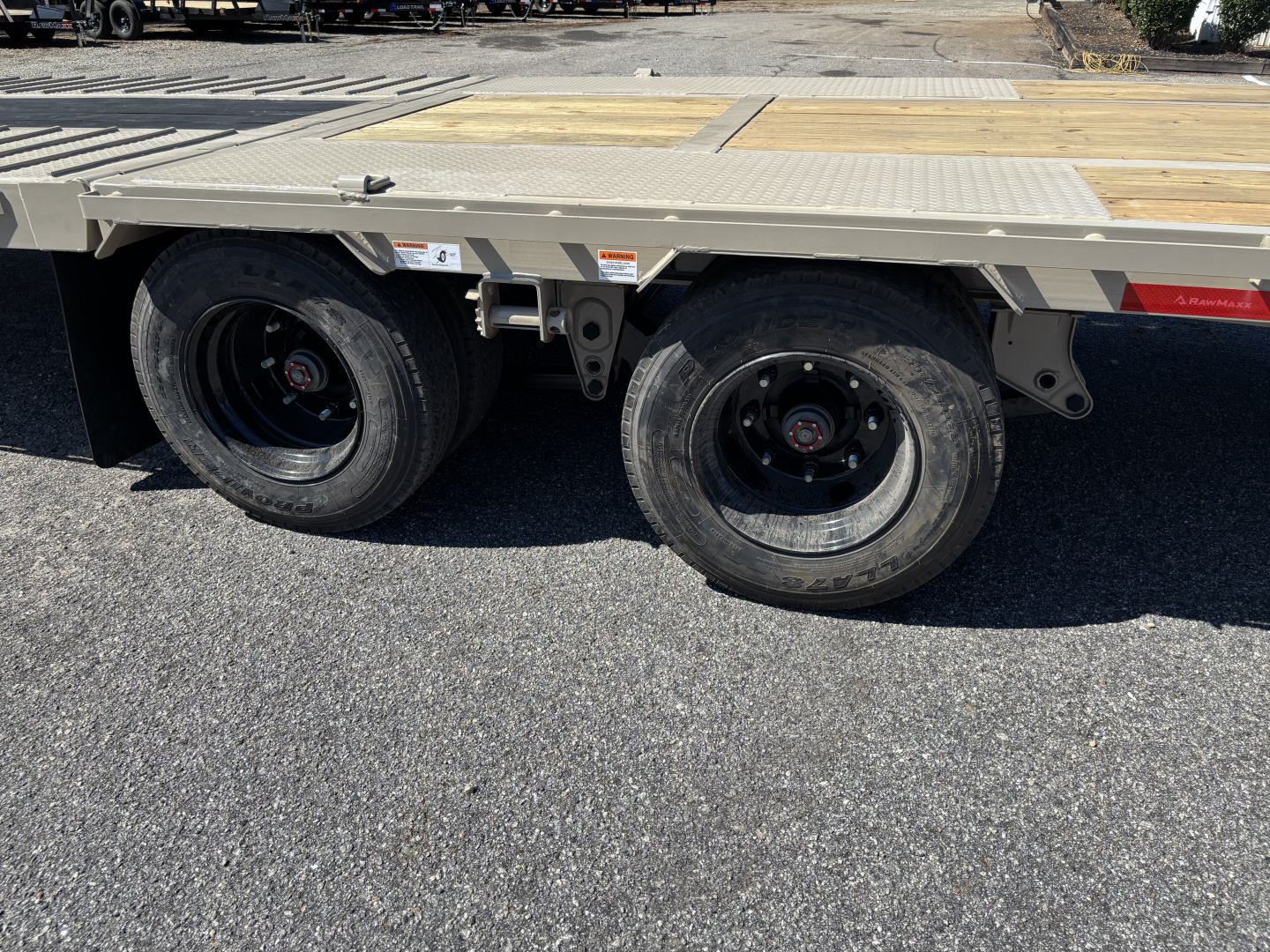 New 2026 RawMaxx HTX 102X32 Flatbed Trailer / SOLAR PANEL / WIRELESS REMOTE / 12" OC / 18 PLY TIRES / ELE./HYD. DISC BRAKES / 32K GVWR