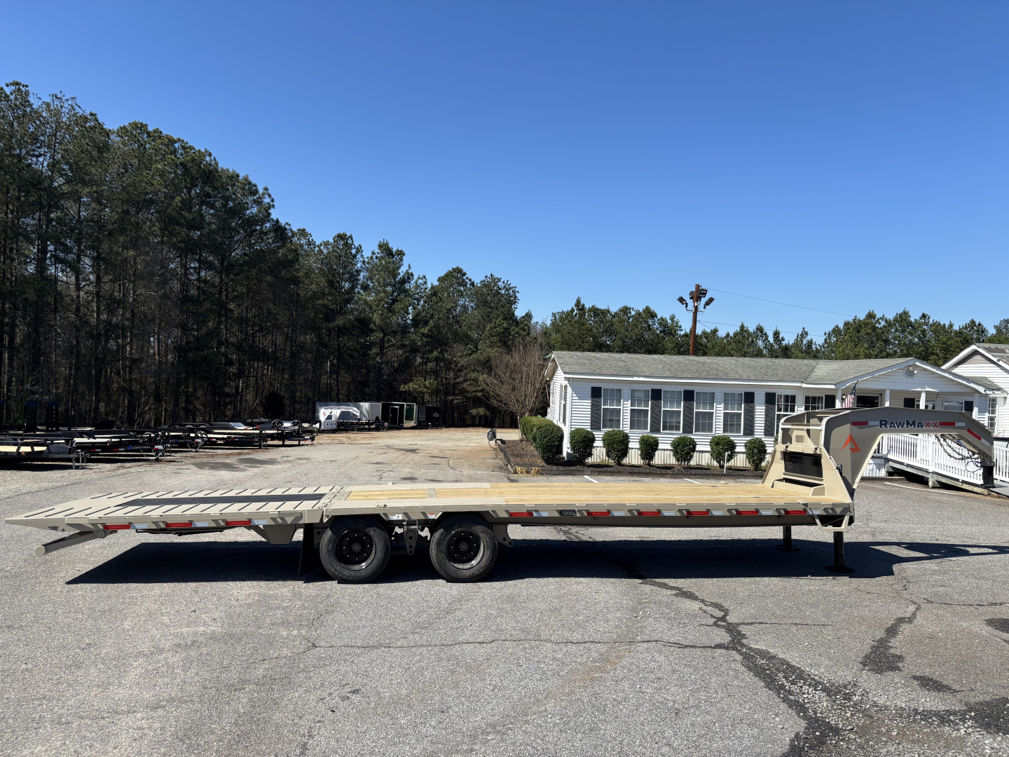 New 2026 RawMaxx HTX 102X32 Flatbed Trailer / SOLAR PANEL / WIRELESS REMOTE / 12" OC / 18 PLY TIRES / ELE./HYD. DISC BRAKES / 32K GVWR