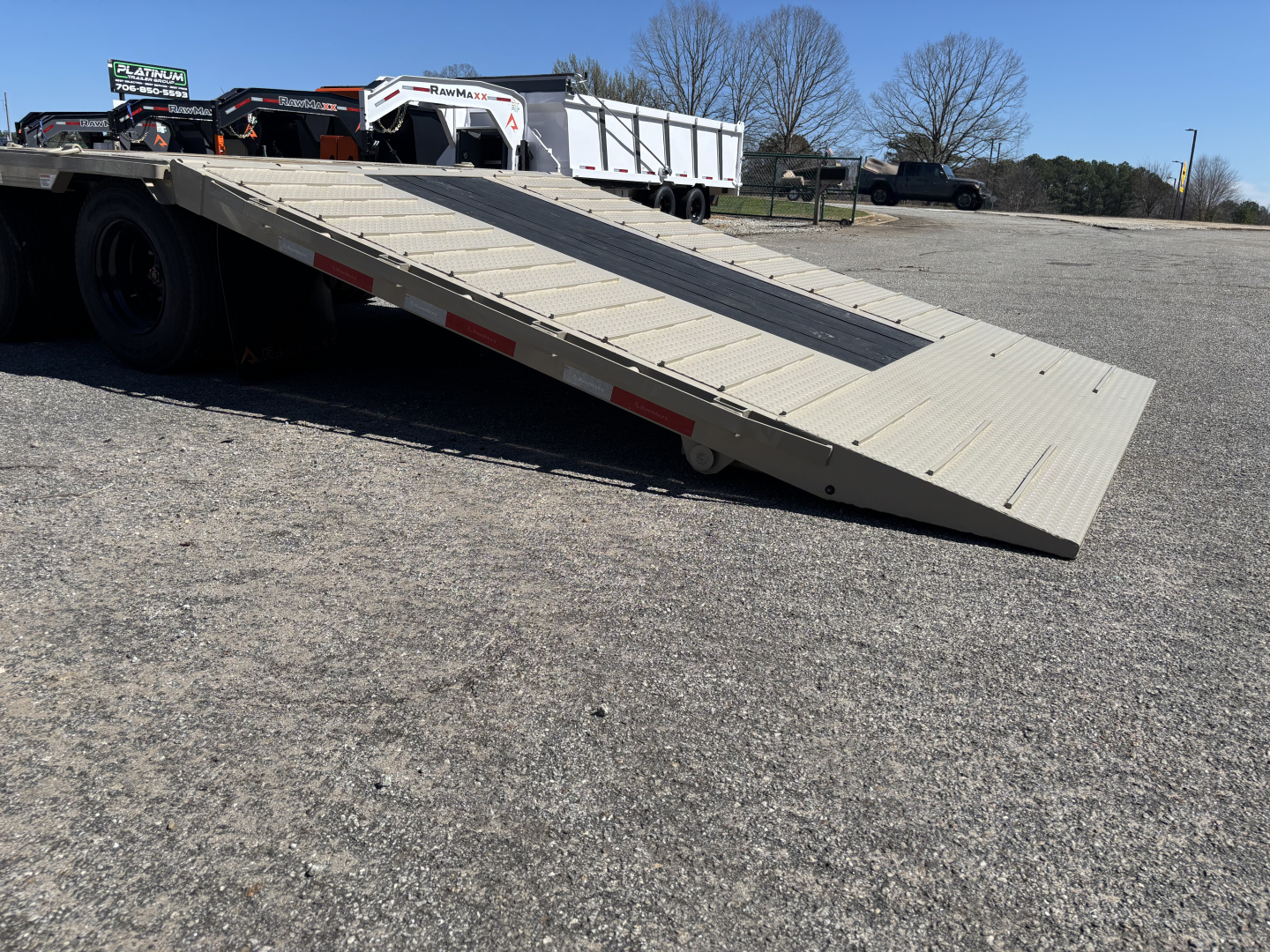 New 2026 RawMaxx HTX 102X32 Flatbed Trailer / SOLAR PANEL / WIRELESS REMOTE / 12" OC / 18 PLY TIRES / ELE./HYD. DISC BRAKES / 32K GVWR