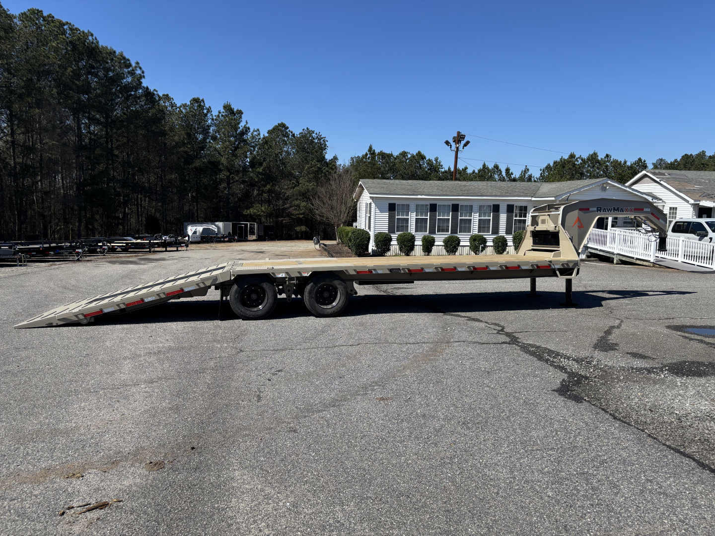 New 2026 RawMaxx HTX 102X32 Flatbed Trailer / SOLAR PANEL / WIRELESS REMOTE / 12" OC / 18 PLY TIRES / ELE./HYD. DISC BRAKES / 32K GVWR