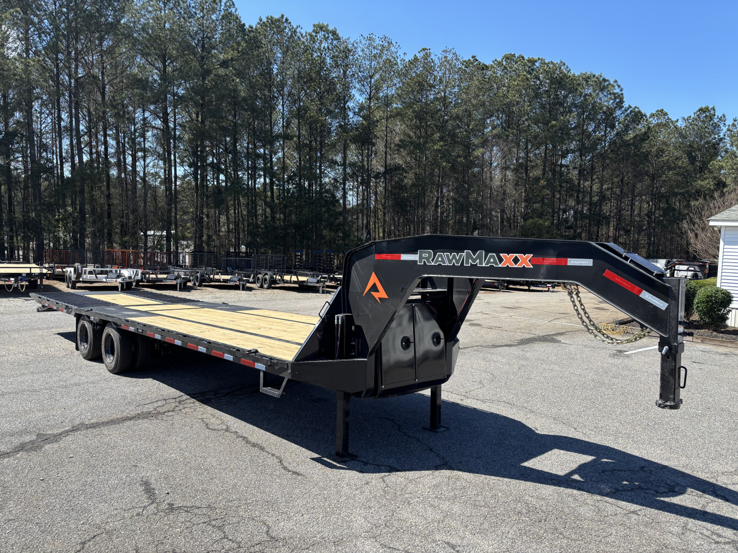 New 2026 RawMaxx HTX 102X32 Flatbed Trailer / SOLAR PANEL / WIRELESS REMOTE / 12" OC / 18 PLY TIRES / ELE./HYD. DISC BRAKES / 32K GVWR