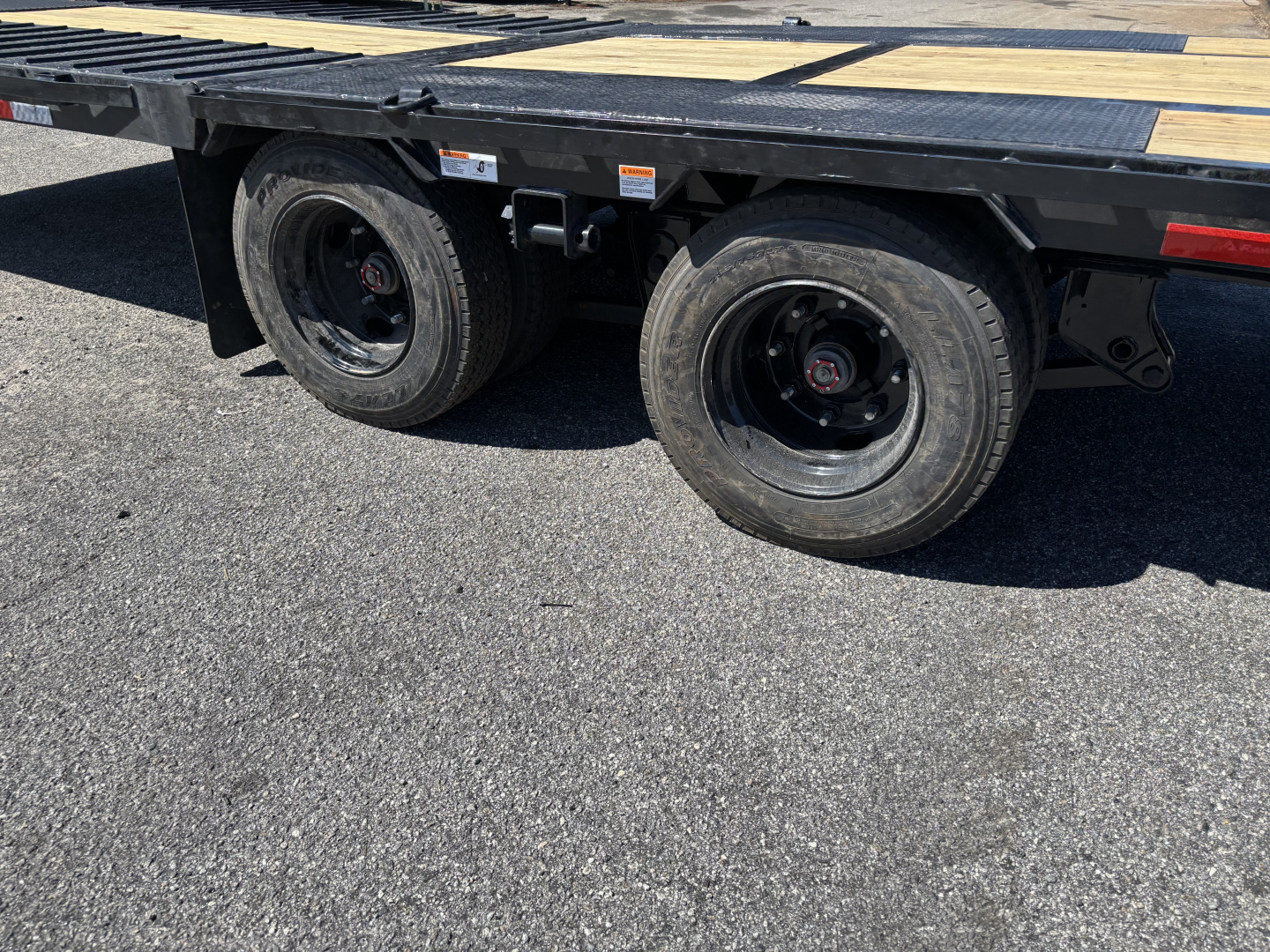 New 2026 RawMaxx HTX 102X32 Flatbed Trailer / SOLAR PANEL / WIRELESS REMOTE / 12" OC / 18 PLY TIRES / ELE./HYD. DISC BRAKES / 32K GVWR