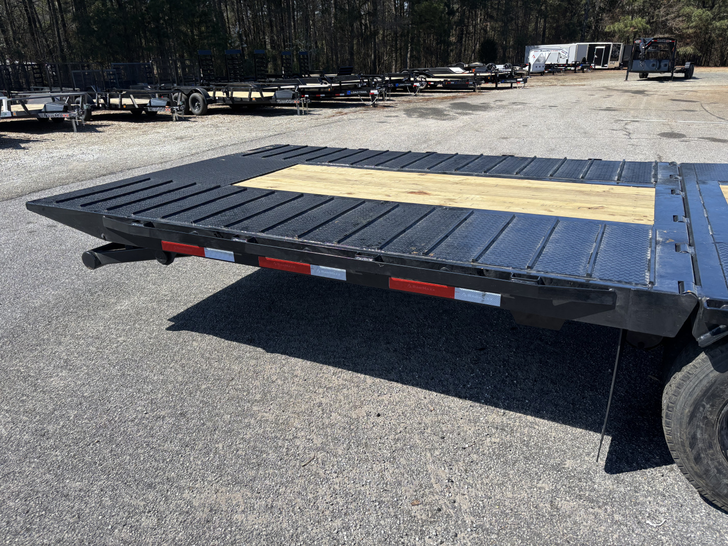 New 2026 RawMaxx HTX 102X32 Flatbed Trailer / SOLAR PANEL / WIRELESS REMOTE / 12" OC / 18 PLY TIRES / ELE./HYD. DISC BRAKES / 32K GVWR