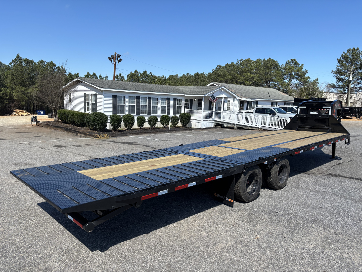 New 2026 RawMaxx HTX 102X32 Flatbed Trailer / SOLAR PANEL / WIRELESS REMOTE / 12" OC / 18 PLY TIRES / ELE./HYD. DISC BRAKES / 32K GVWR