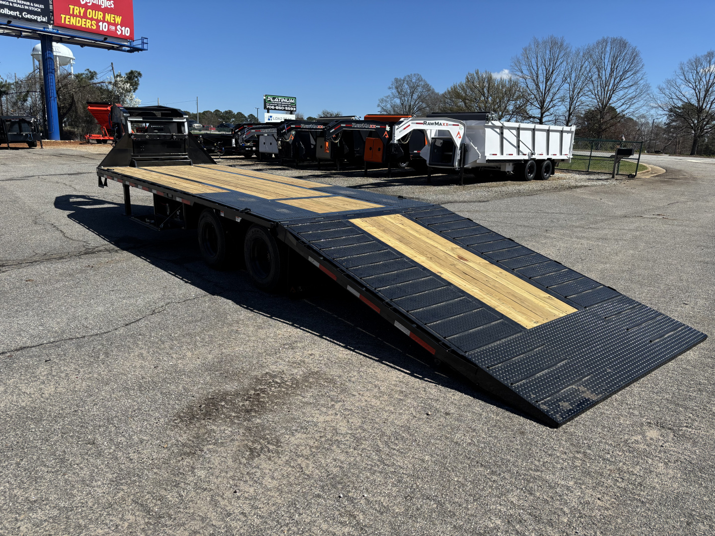 New 2026 RawMaxx HTX 102X32 Flatbed Trailer / SOLAR PANEL / WIRELESS REMOTE / 12" OC / 18 PLY TIRES / ELE./HYD. DISC BRAKES / 32K GVWR