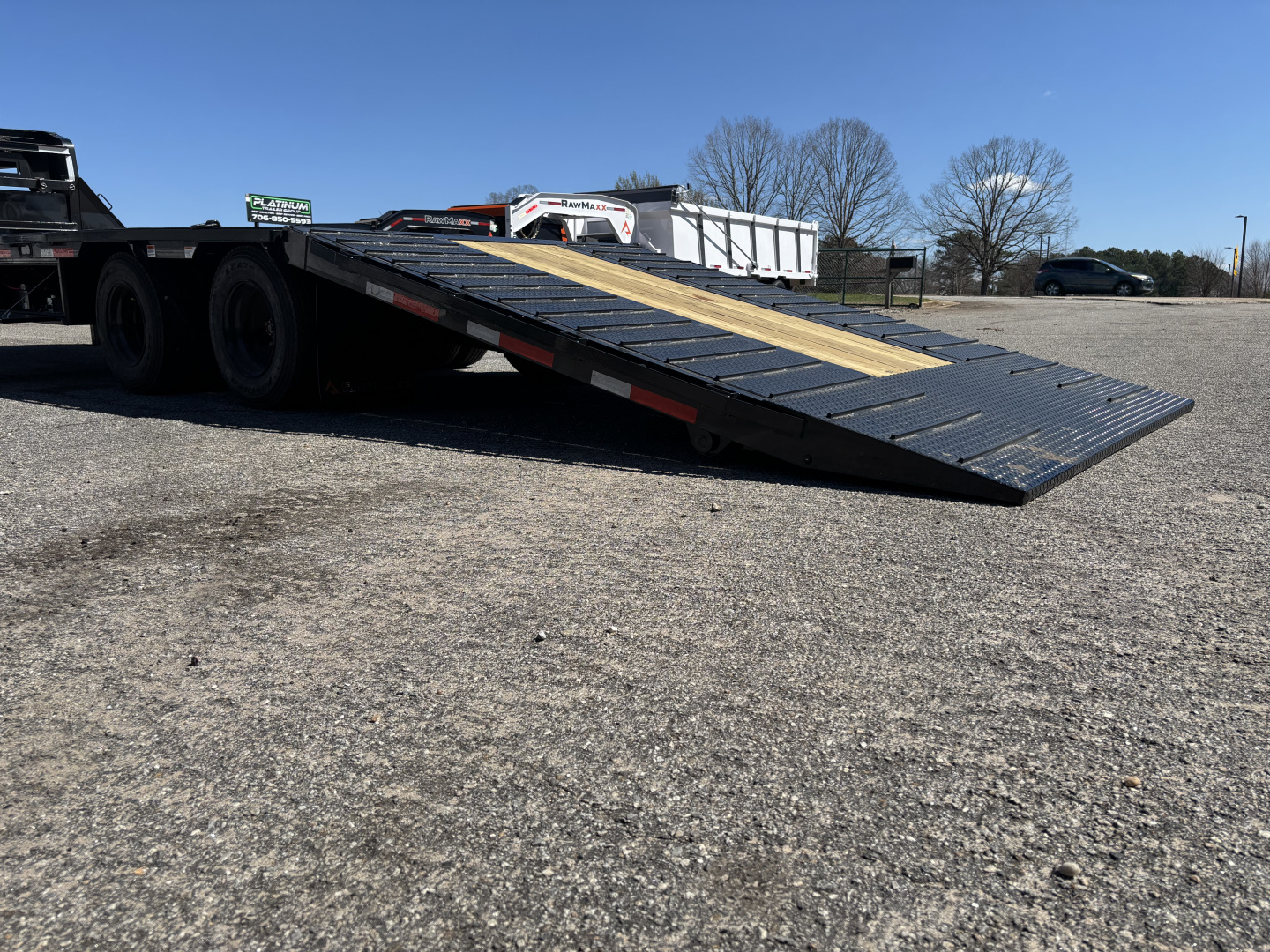 New 2026 RawMaxx HTX 102X32 Flatbed Trailer / SOLAR PANEL / WIRELESS REMOTE / 12" OC / 18 PLY TIRES / ELE./HYD. DISC BRAKES / 32K GVWR