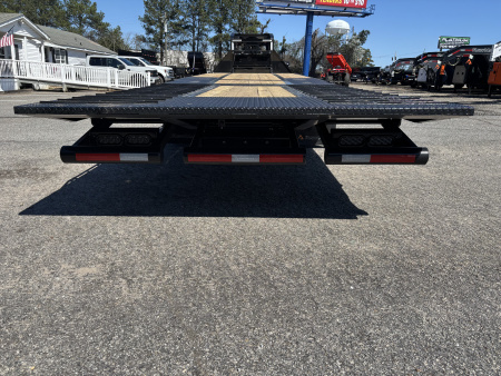 New 2026 RawMaxx HTX 102X32 Flatbed Trailer / SOLAR PANEL / WIRELESS REMOTE / 12" OC / 18 PLY TIRES / ELE./HYD. DISC BRAKES / 32K GVWR