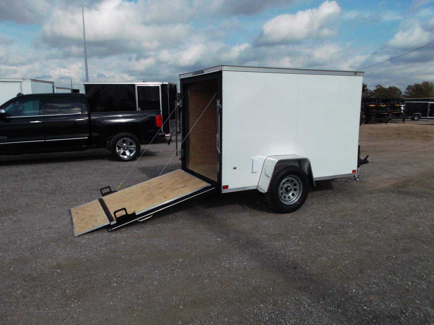 New 2026 Covered Wagon Trailers 5x8 Cargo Trailer / Enclosed Trailer / Ramp / LED's / .030 White Semi-Screwless Exterior / Bed Lined Tongue and Frame