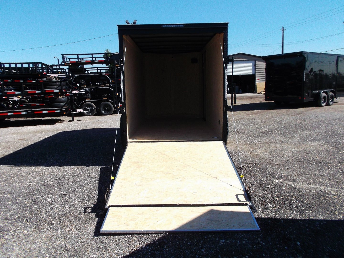 New 2026 Covered Wagon Trailers 6x12 Cargo / Enclosed Trailer / 6'6" Interior Height / Extra Wide Ramp Gate / RV Side Door / .080 Black Poly Core / Black Out Package