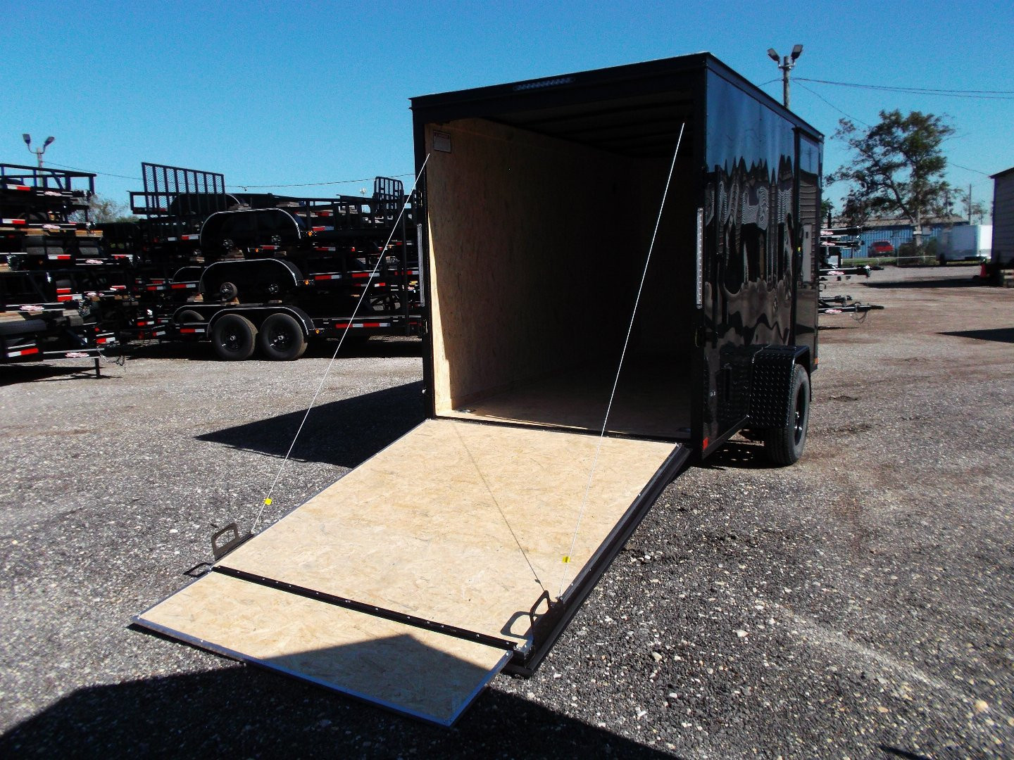New 2026 Covered Wagon Trailers 6x12 Cargo / Enclosed Trailer / 6'6" Interior Height / Extra Wide Ramp Gate / RV Side Door / .080 Black Poly Core / Black Out Package