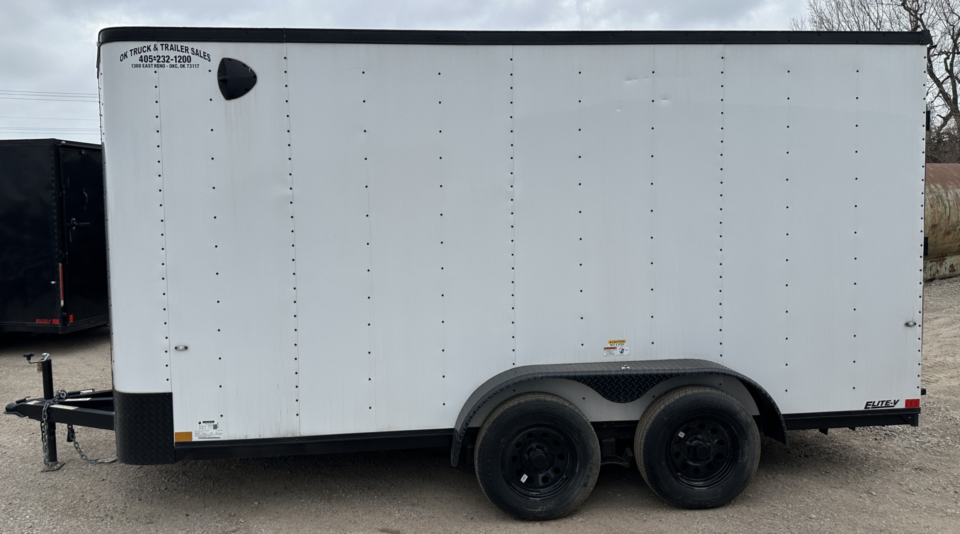 New 2025 Cargo Craft 7'x16'x7'tall, Elite V Nose with a ramp door & white/black out Cargo / Enclosed Trailer