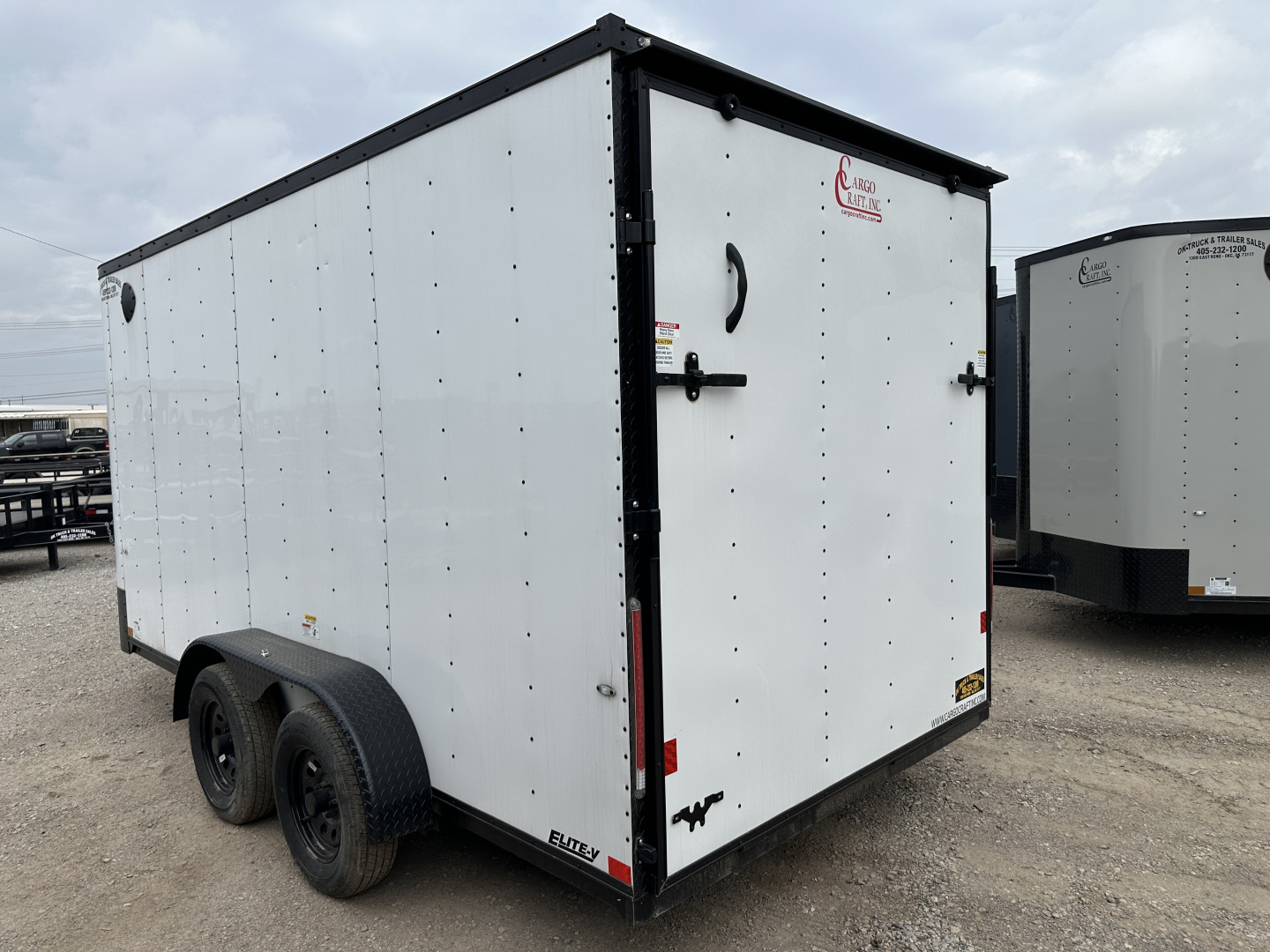 New 2025 Cargo Craft 7'x16'x7'tall, Elite V Nose with a ramp door & white/black out Cargo / Enclosed Trailer