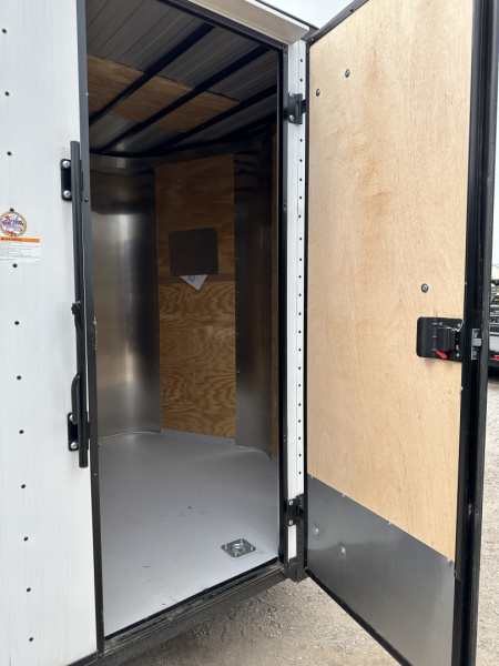 New 2025 Cargo Craft 7'x16'x7'tall, Elite V Nose with a ramp door & white/black out Cargo / Enclosed Trailer