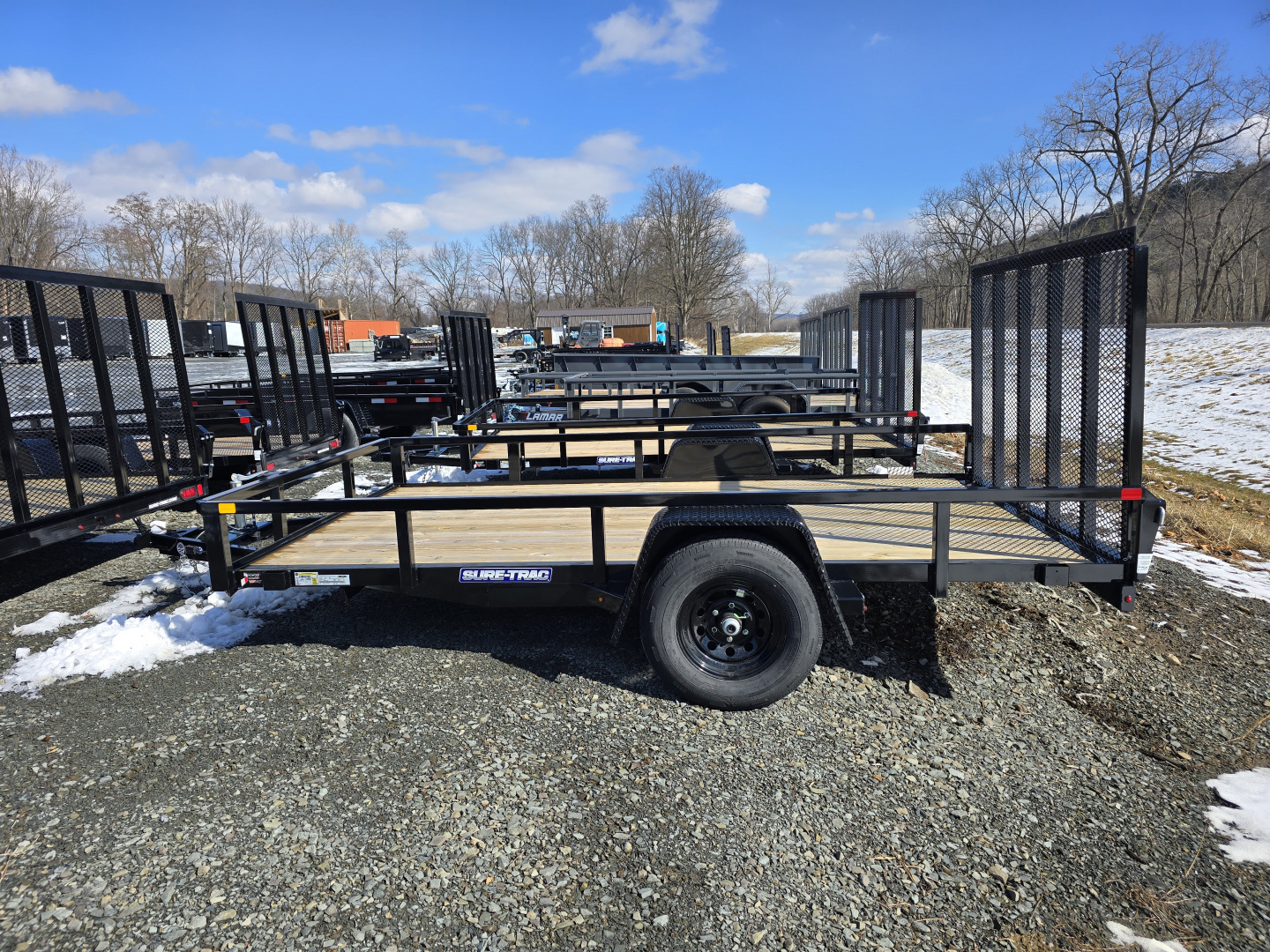 New 2026 Sure-Trac 7x12 5K Tube Top Utility Trailer- Fold Flat Ramp- Self Retaining Gate Pins- Spare Tire Carrier- Brakes- Pressure Treated Decking