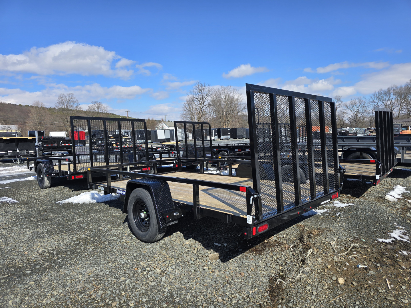 New 2026 Sure-Trac 7x12 5K Tube Top Utility Trailer- Fold Flat Ramp- Self Retaining Gate Pins- Spare Tire Carrier- Brakes- Pressure Treated Decking