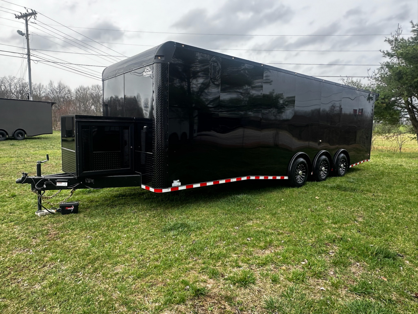 New 2026 Rock Solid Cargo 8.5x28 Race Trailer -Finished Interior-7000LB Triple Torsion-HD Ramp-Awning-GEN. Box-1/2 Outdoor Carpet Walls