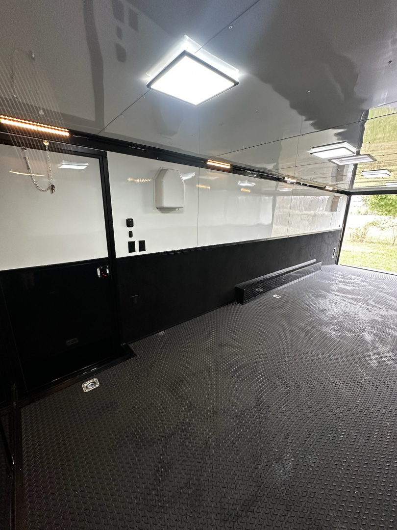 New 2026 Rock Solid Cargo 8.5x28 Race Trailer -Finished Interior-7000LB Triple Torsion-HD Ramp-Awning-GEN. Box-1/2 Outdoor Carpet Walls
