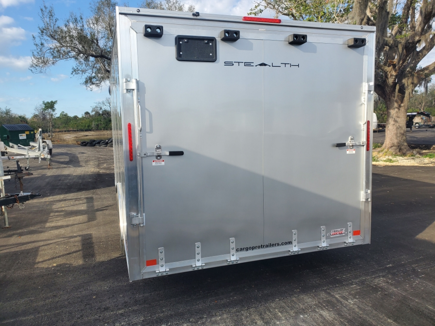 New 2026 ALCOM 8.5X16 XLT STEALTH ALUMINUM CAR HAULER Car / Racing Trailer ENCLOSED TRAILER WITH REAR RAMP DOOR, 6'10" INTERIOR HEIGHT, SCREWLESS EXTERIOR, 1 PIECE ALUMINUM ROOF, 4 D-RINGS