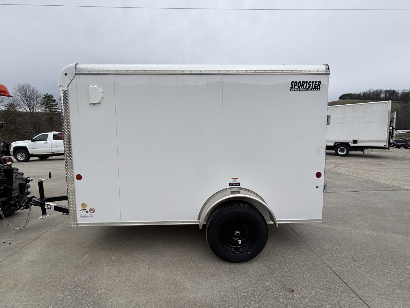 New 2026 Car Mate Trailers 5X10 Sportster Enclosed Trailer - Crystal White - 6" extra height - W/ Ramp Door - 2990# GVWR