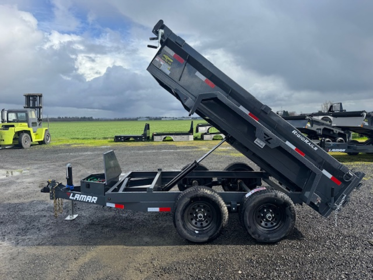 New 2026 LAMAR TRAILERS 60" x 10' DS25 Tandem Axle 10K Dump Trailer 18" SIDES