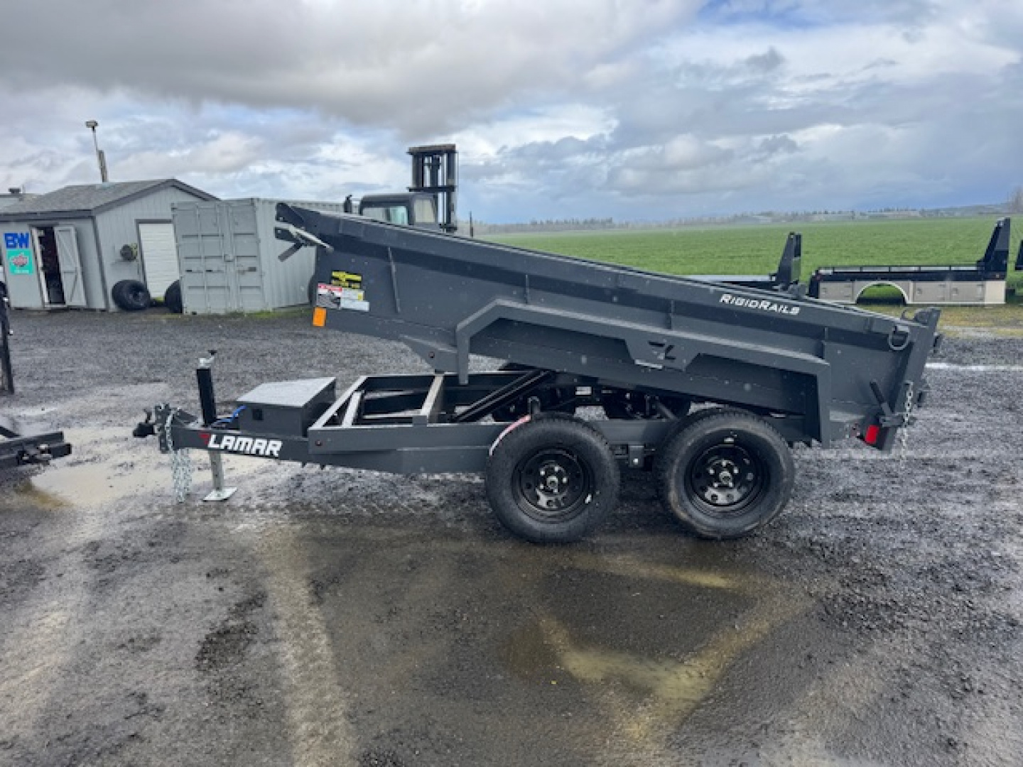 New 2026 LAMAR TRAILERS 60" x 10' DS23 Tandem Axle 7K Dump Trailer 18"SIDES