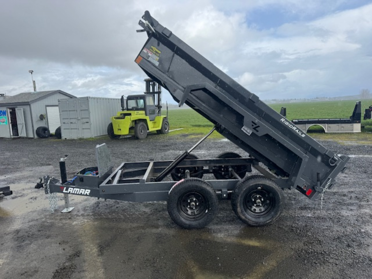 New 2026 LAMAR TRAILERS 60" x 10' DS23 Tandem Axle 7K Dump Trailer 18"SIDES