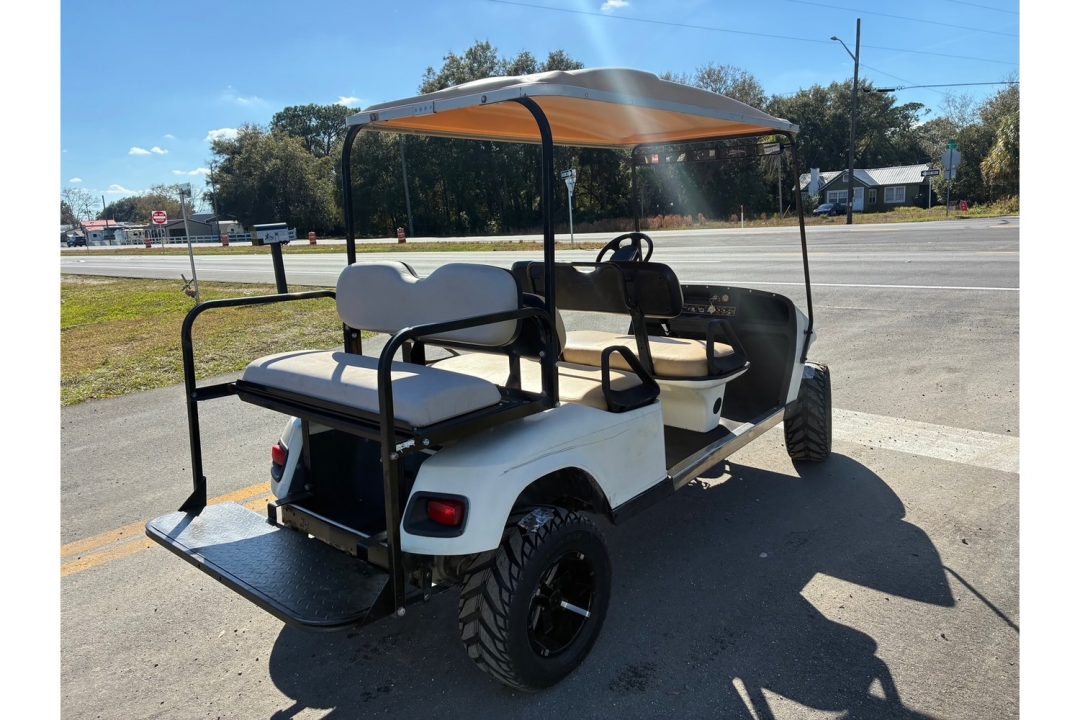 Used 2006 E-Z-GO 6 Seater Gas Lifted Golf Cart with New Tires Golf Cart