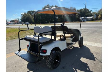 Used 2006 E-Z-GO 6 Seater Gas Lifted Golf Cart with New Tires Golf Cart