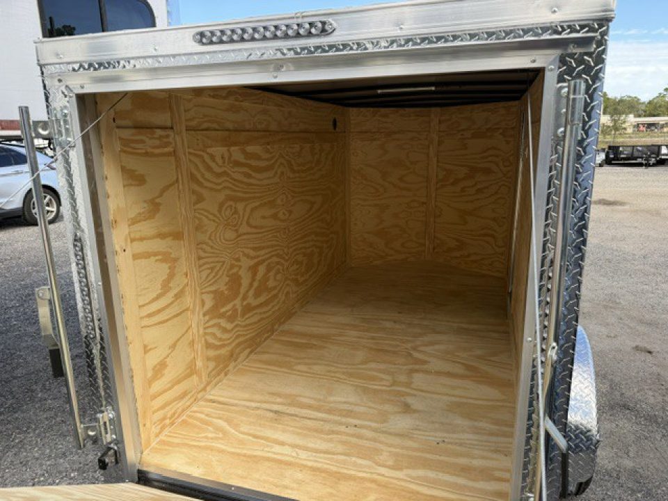 New 2026 Ware Cargo Trailers 5 x 10 Black Single Axle Enclosed Trailer with Side Door and Ramp