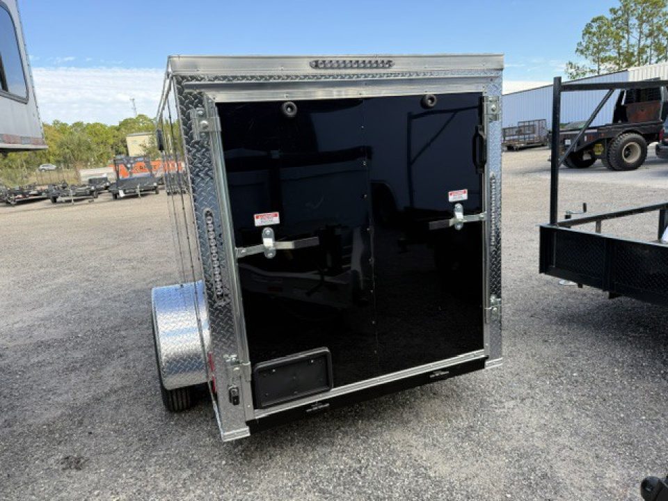 New 2026 Ware Cargo Trailers 5 x 10 Black Single Axle Enclosed Trailer with Side Door and Ramp