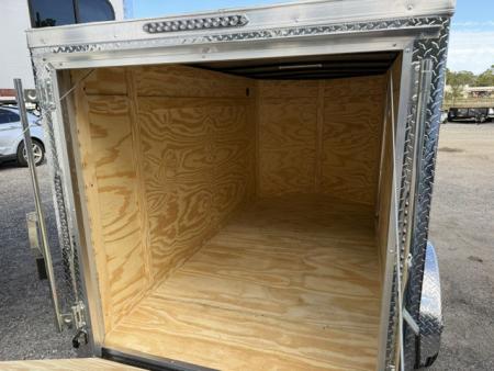 New 2026 Ware Cargo Trailers 5 x 10 Black Single Axle Enclosed Trailer with Side Door and Ramp