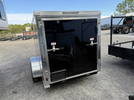 New 2026 Ware Cargo Trailers 5 x 10 Black Single Axle Enclosed Trailer with Side Door and Ramp