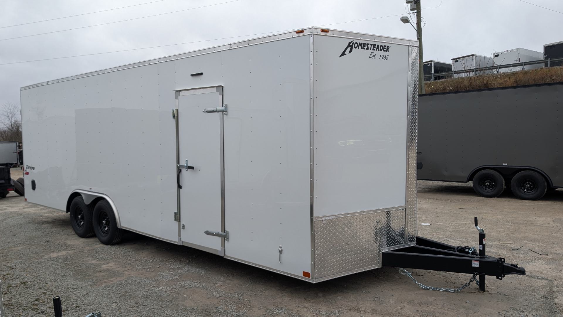 New 2026 Homesteader 8.5 x 24 HD SERIES Intrepid Car Hauler w/ Ramp (84" Inside)