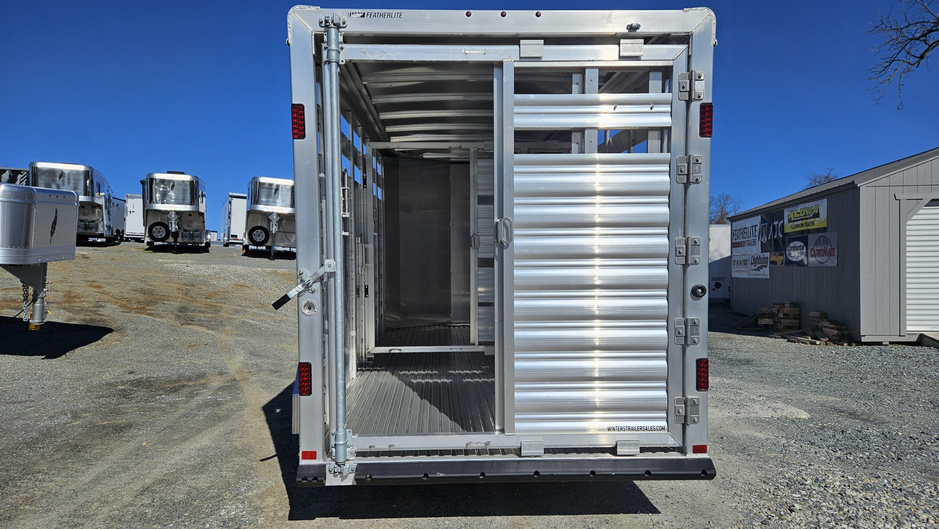 New 2026 Featherlite Trailers 8107 6'7"X16'TA Stock / Stock Combo Trailer