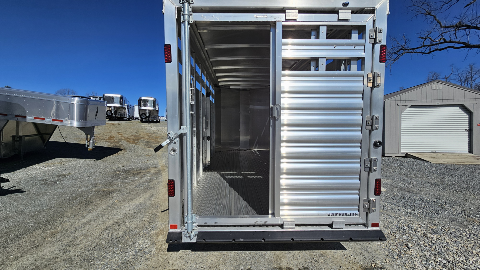 New 2026 Featherlite Trailers 8107 6'7"X16'TA Stock / Stock Combo Trailer